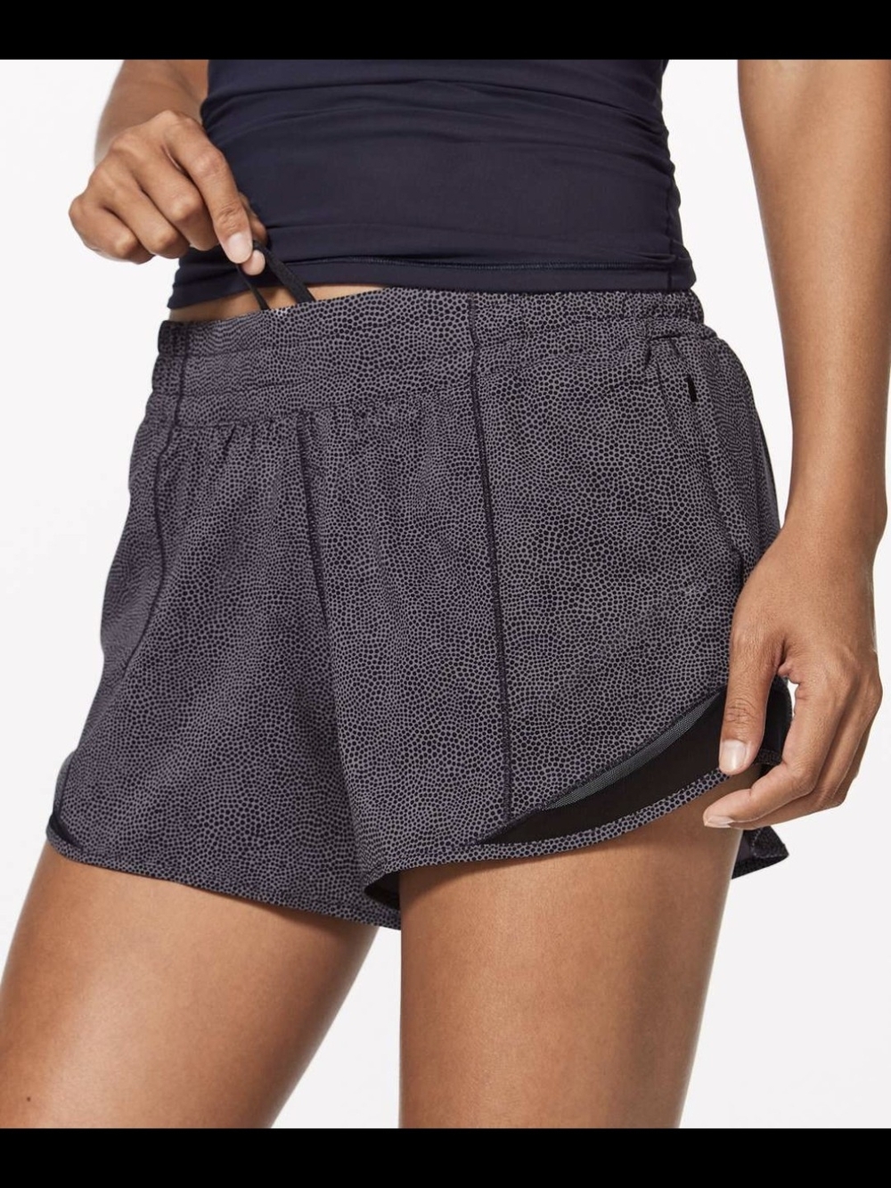 Lululemon Hotty Hot Shorts feature a distinctive "Disperse Dusky Lavender"